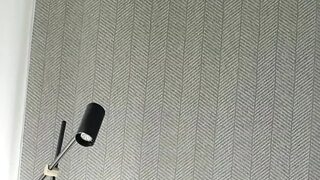 Julie satisfies herself in the relaxation room of a public sauna