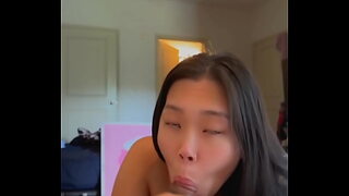 Down on my knees giving a blowjob like a good asian slut HUGE CUMSHOT IN MOUTH